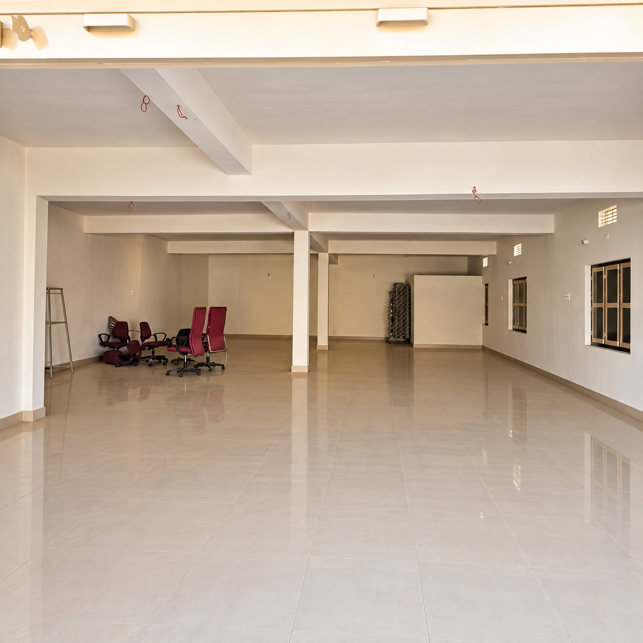 Spacious Empty Hall with Red Chairs Commercial space for rent - Image 1