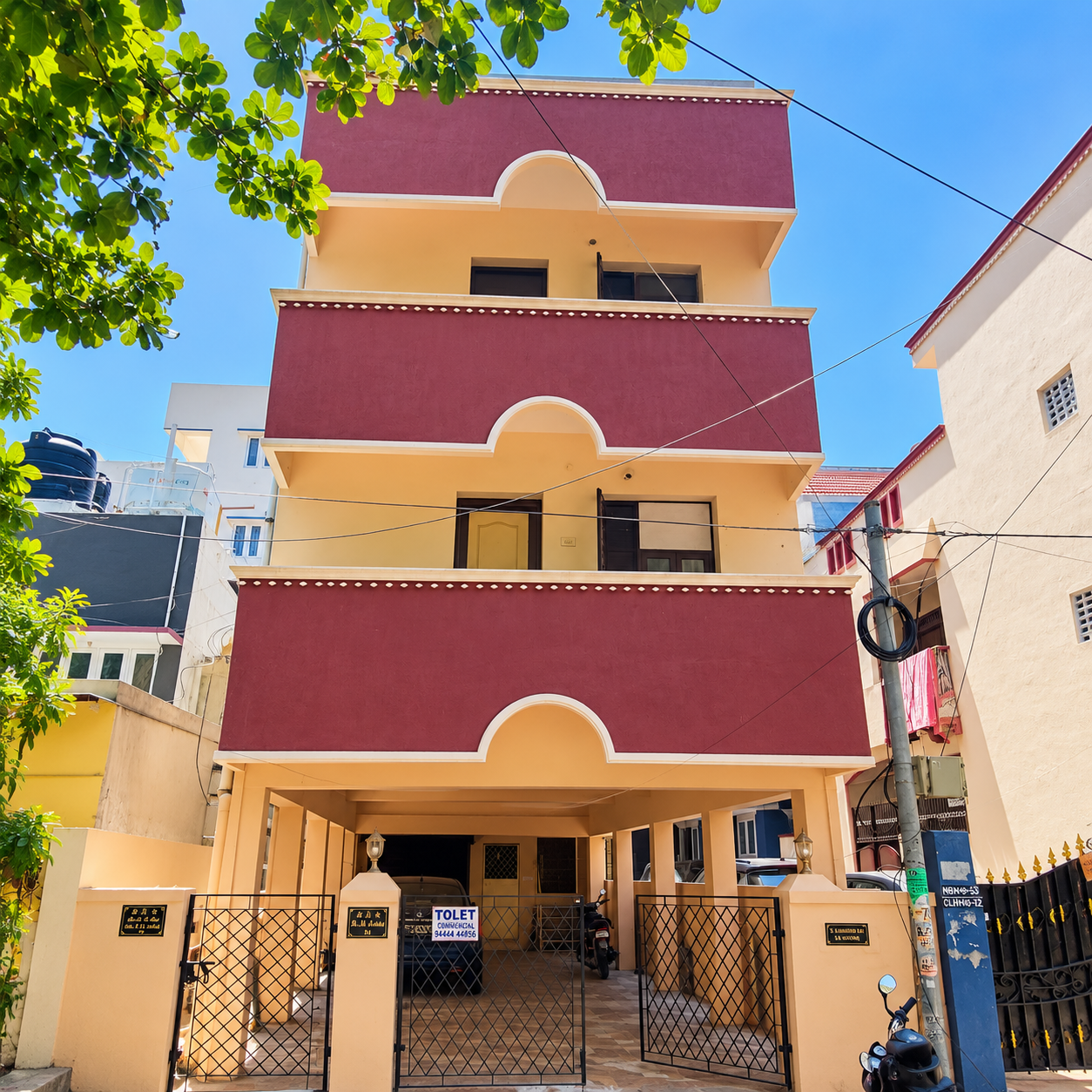 Vibrant Maroon-Balcony Apartment Facade Flat for rent - Image 1